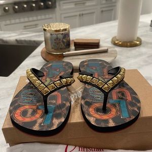 Authentic Christian, Louboutin rubber flip-flops. Like new condition.